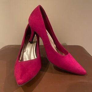 Red suede pointed toe heels
